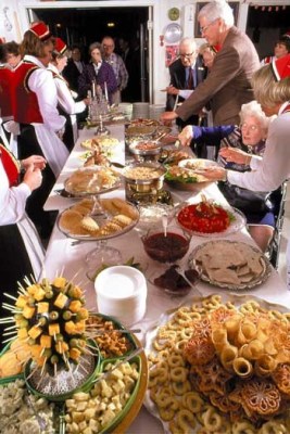 Serving line at Norse smörgåsbord, showing artistic presentation of Nordic cuisine