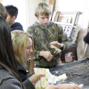 Students Skinning Codfish, in preparation for Cranfills Gap Lutefisk Supper