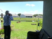 Dan taking a photo of the gator and me taking of photo of him.