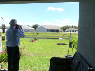 Dan taking a photo of the gator and me taking of photo of him.